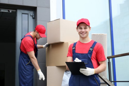 People organising a moving service with boxes and paperwork