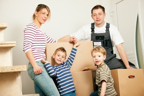 Packed office boxes and dismantled furniture ready for transport