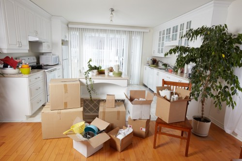 Careful handling of a grand piano during a local West London relocation