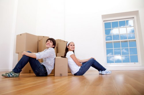 Removal team planning a move in Shepherds Bush residential street