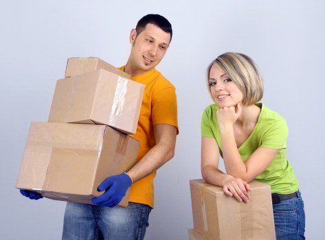 Workstations and office furniture being prepared for relocation
