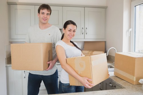 Loading furniture and boxes into a van for a Shepherds Bush relocation